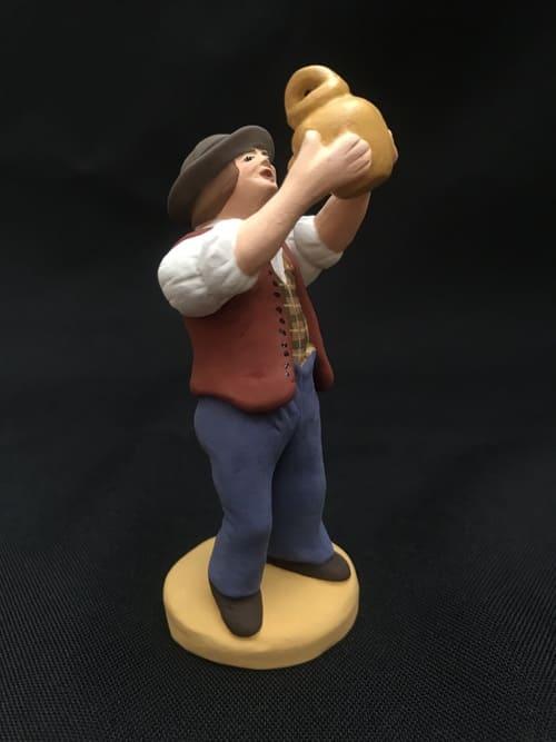 Homme buvant à la régalade   27 €