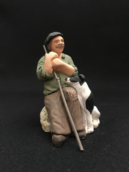 Berger assis et son chien   32 €