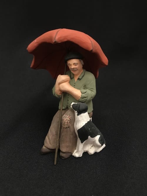 Berger assis au parapluie   37 €