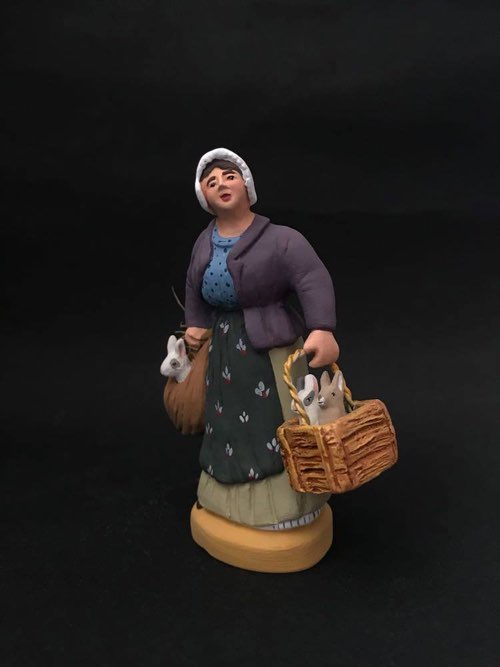 Femme aux lapins   32 €