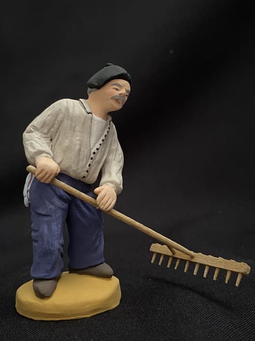 Homme au râteau   27 €