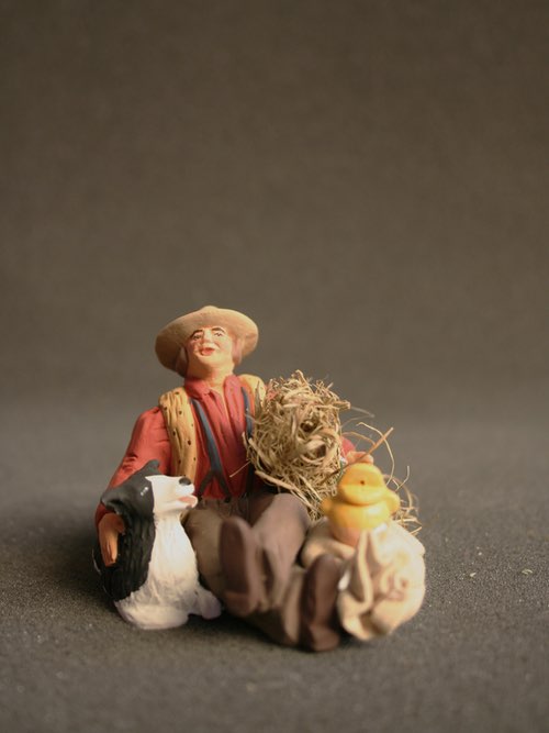 Paysan assis et son chien - 37 €